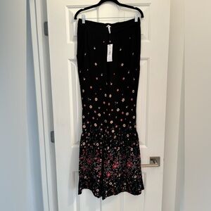NWT BCBGeneration bell bottom black flowered pants - medium (large)